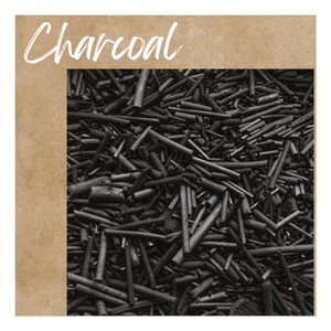 Many sticks of charcoal randomly arranged